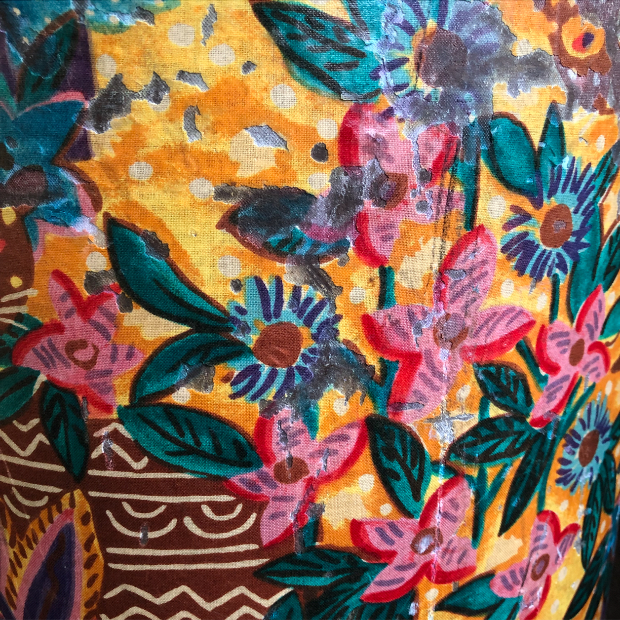 the side of a brightly painted drum