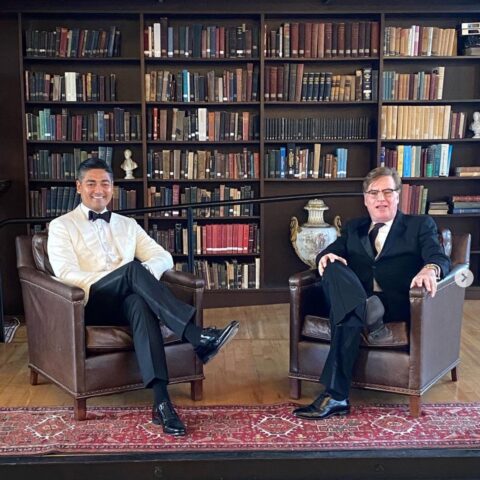 Aftab Pureval and Aaron Sorkin, seated in leather chairs in front of bookcases at the Mercantile Library
