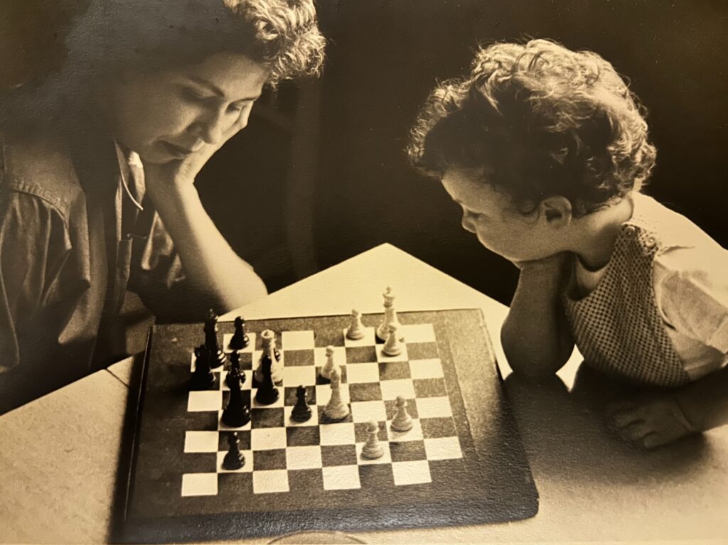 Joyce and Jule study the chessboard