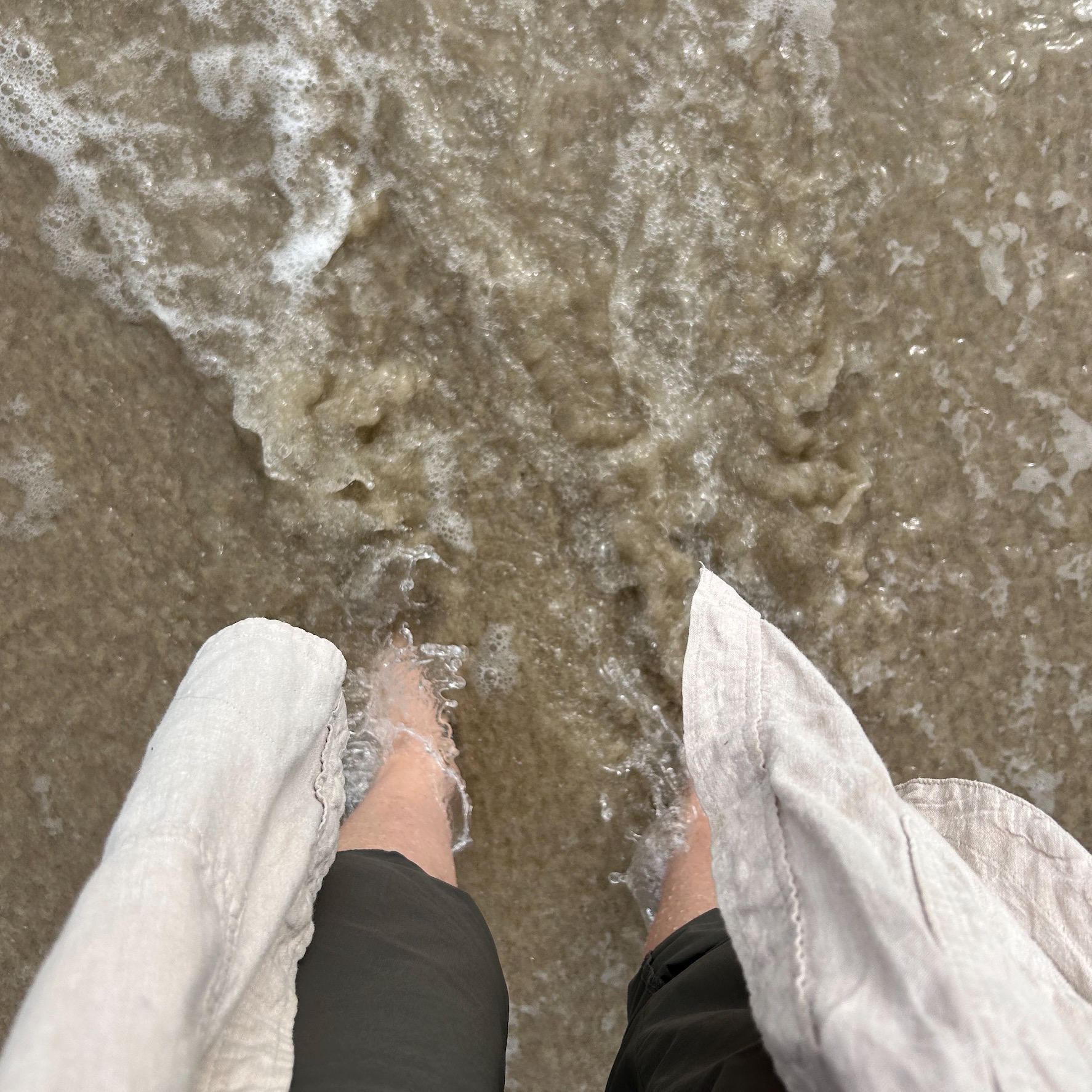 Feet in the sand & sea